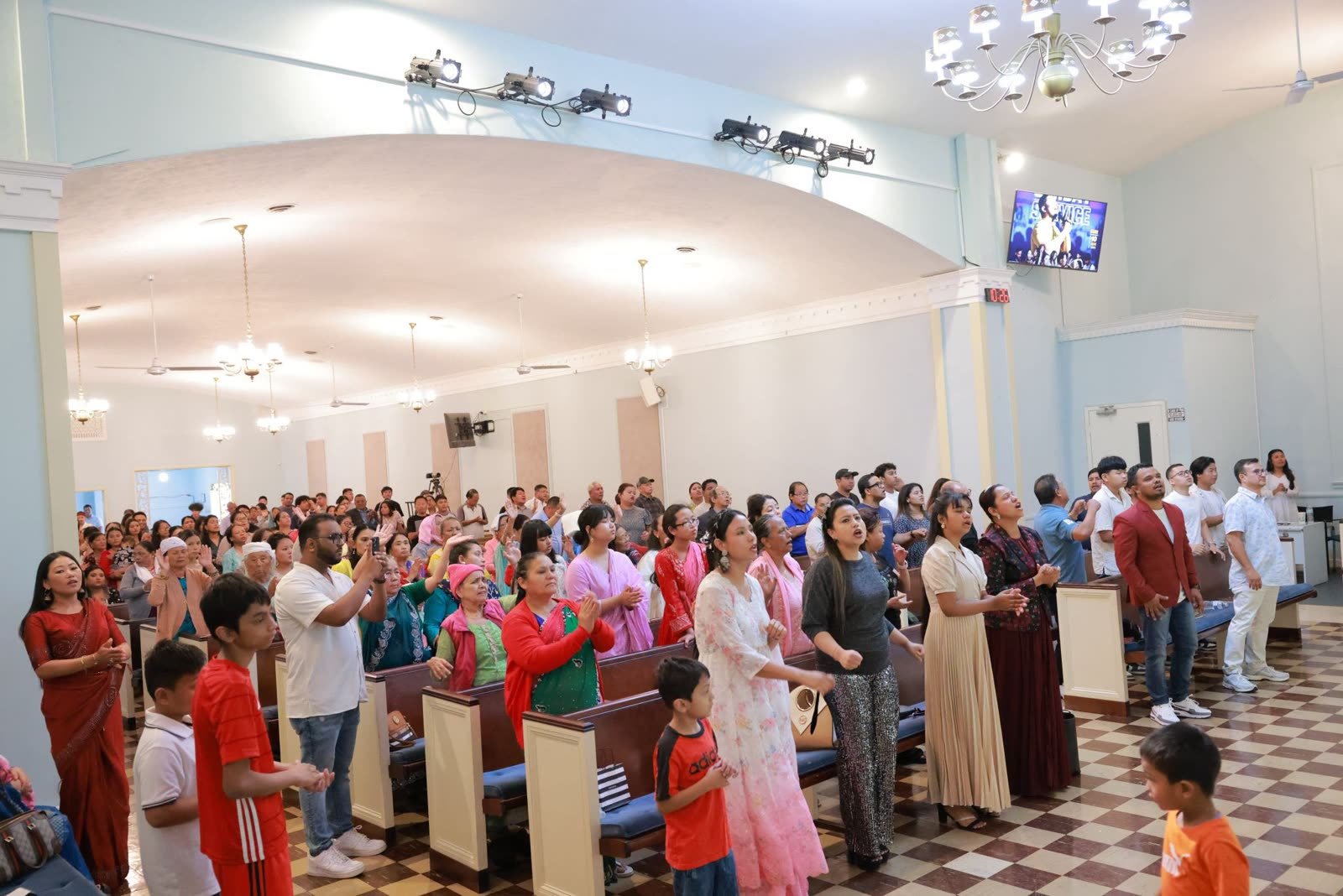 The congregation worshiping together at Word and Life Church